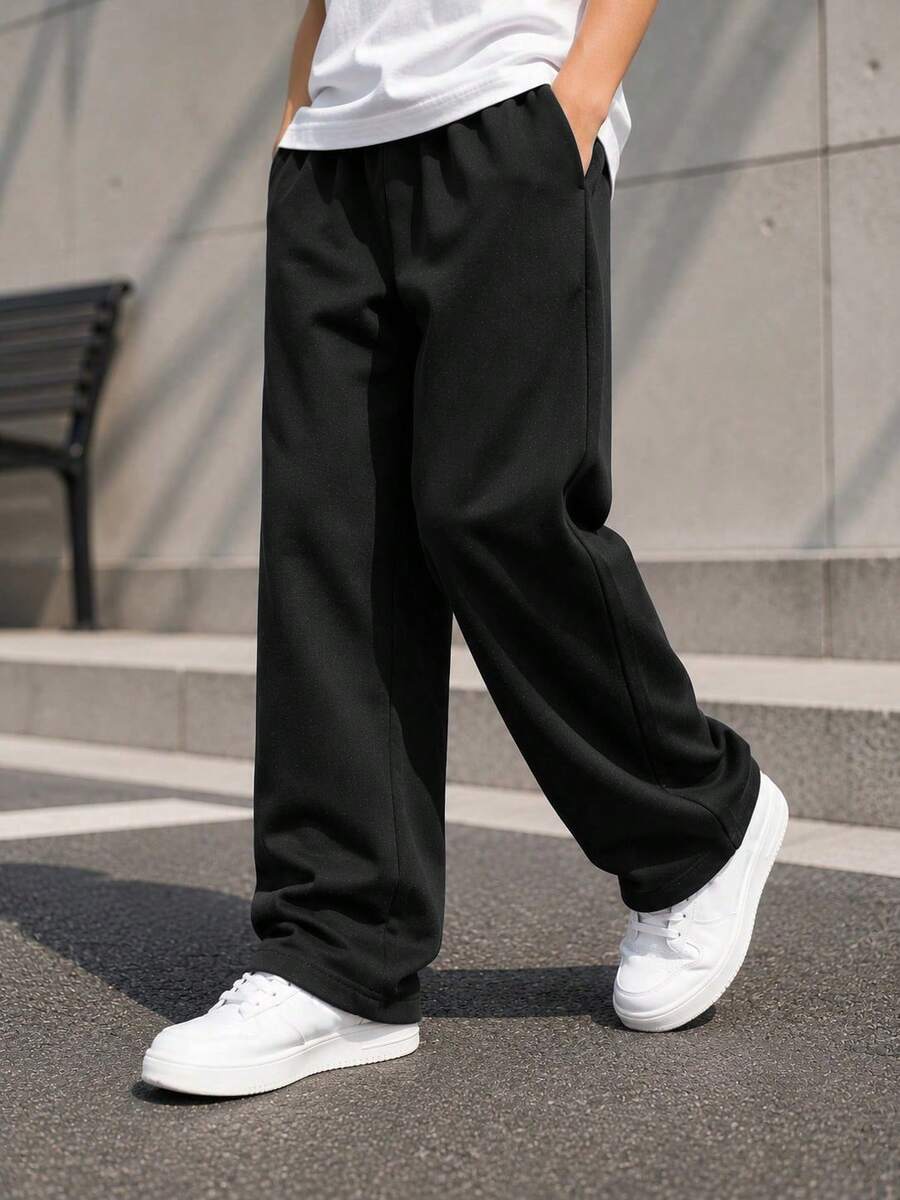 Tween Boy Casual Minimalist Versatile College Style Black Long Pants With Diagonal Pockets, Suitable For Vacation, Travel, Sports, School And Daily Wear - Black - View 1