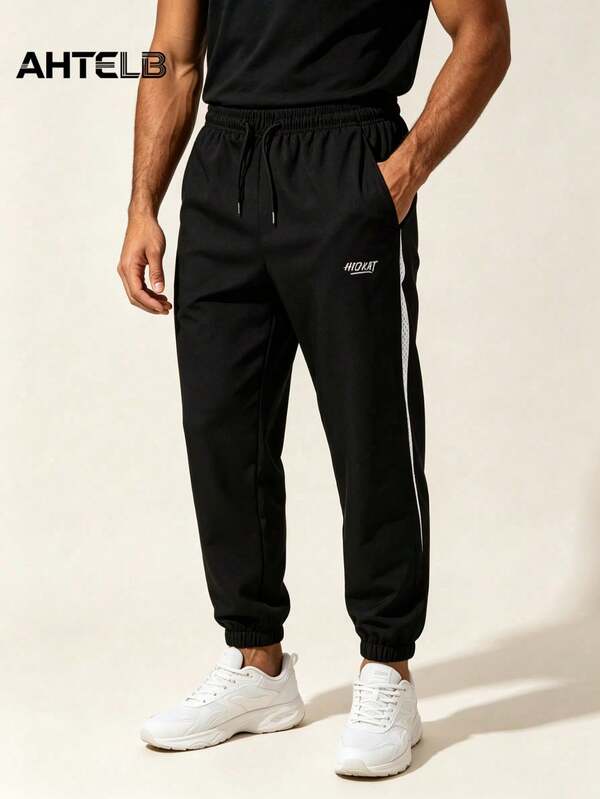 AHTELB Men's Spring/Autumn Side Mesh Printed Joggers, Elastic Waist Drawstring Design, Thin Quick-Dry Micro-Stretch Fitness Running Sports Pants Black