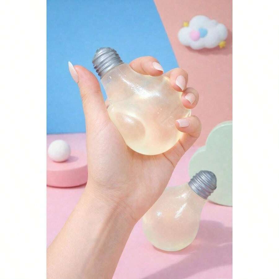 1pc Light Bulb Shaped Squeeze Toy, Glowing Night Light Flexible Hand Toy, Transparent Creative Desktop Ornament, Suitable As Small Gift For Teenagers And Adults