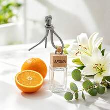 1 ambientador para coche, 11 ml, aroma a naranja, peso de 80 g, colgante para el espejo retrovisor, disponible en varios estilos, un regalo ideal para eliminar olores en el coche. - Aroma a naranja - Ver 2