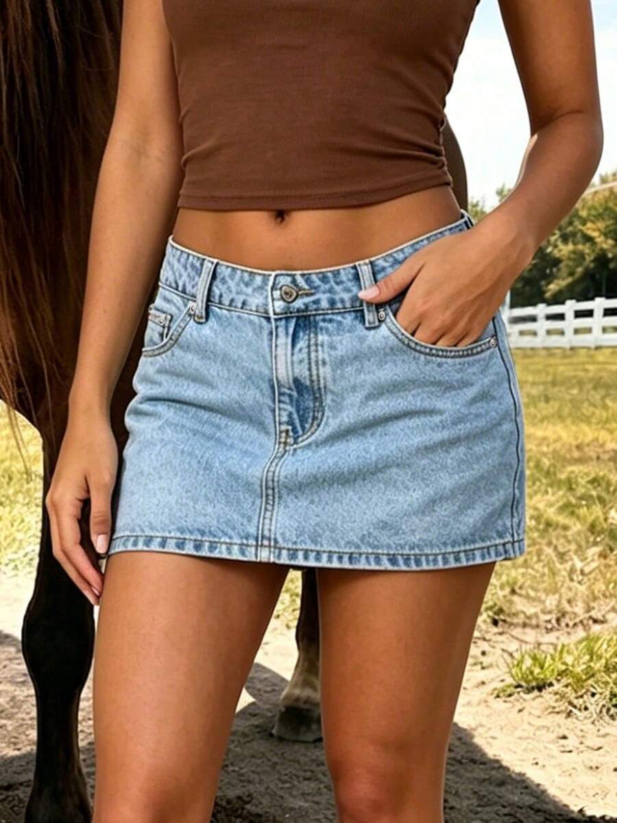 Whisplicity Women's Low Waist Solid Color Casual Minimalist Denim Mini Skirt, Summer - Light Wash - View 1