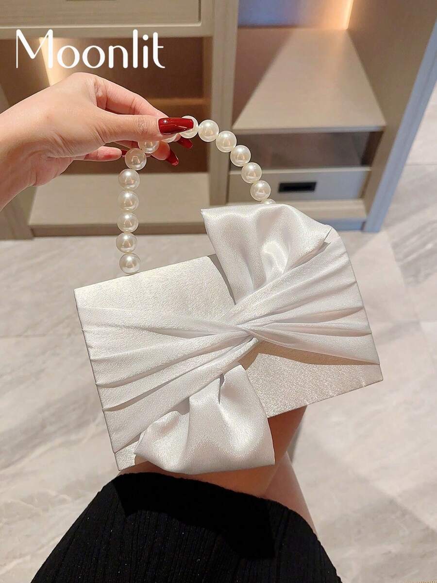 女士精致优雅的蝴蝶结细节形装饰晚宴包，配有仿珍珠，手提，适合晚礼服 Tready 新娘包，非常适合派对、婚礼、舞会、晚宴/宴会，搭配婚纱、礼服、舞会礼服、生日礼服、派对礼服，送给她的完美情人节礼物，有史以来最好的情人节礼物选择，必备婚礼物品，完美搭配毕业礼服、舞会礼服、优雅的珍珠手拿包、舞会包，完美搭配新娘派对