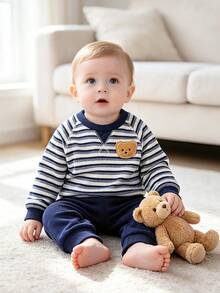 2-delat set för babypojke i blått och vitt med ribbad raglan-sweatshirt med björnpatch och långärmar, samt långbyxor med ribbade muddar, enkel avslappnad ribbstickad vardagsoutfit för barn till vår/höst - Multifärgad - Visa 10