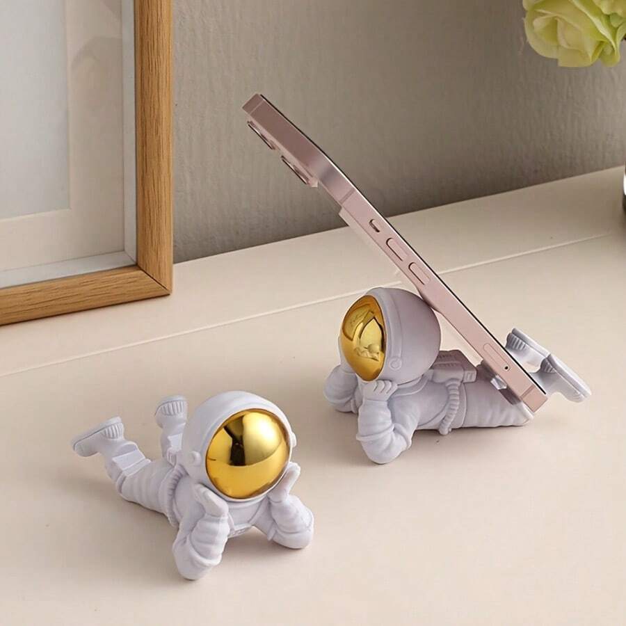 1pc Prone Astronaut Resin Sculpture, Hand-Polished Astronaut Figurine, Multi-Functional Phone Holder Desktop Ornament, Home Office Decor - Multiple Styles - View 1