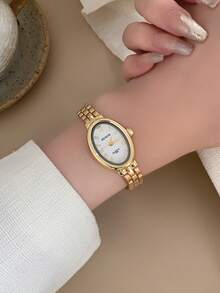 女士優雅金色橢圓羅馬數字面盤石英腕錶，配時尚鏈條錶帶，適合辦公室、約會之夜或日常配戴 - 金色 - 查看 3