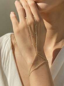 FAAABULS 1pc Gold-Tone Delicate Beaded Finger Bracelet Ring Chain, Small Dot Spaced Pendant Hand Cage Chain, Commute Daily Party Gift Hand Jewelry - Gold - View 1