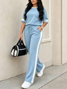 大尺碼女款休閒配色圓領短袖上衣與高腰抽繩直筒長褲2件套 優雅夏季 - 天藍色 - 查看 1