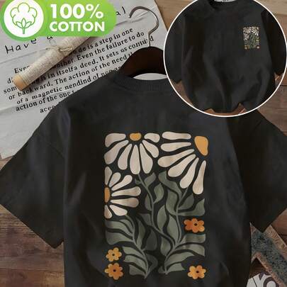 Camiseta feminina neutra com estampa botânica, design estilizado de flores e folhas nas costas, detalhe pequeno combinando no busto, algodão leve e modelagem oversized.
