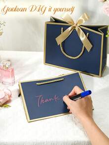 Gift Set For Her/Him 1pc/2pcs, Includes Gold Ribbon, Tissue Paper And Blue Gift Bag, Blue Gift Bag With Gold Trim And Handle, Paper Gift Bag, Shopping Bag, Gift Bag With Bow Ribbon, Suitable For Wedding, Birthday, Valentine's Day, Christmas - Multiple Styles - View 5