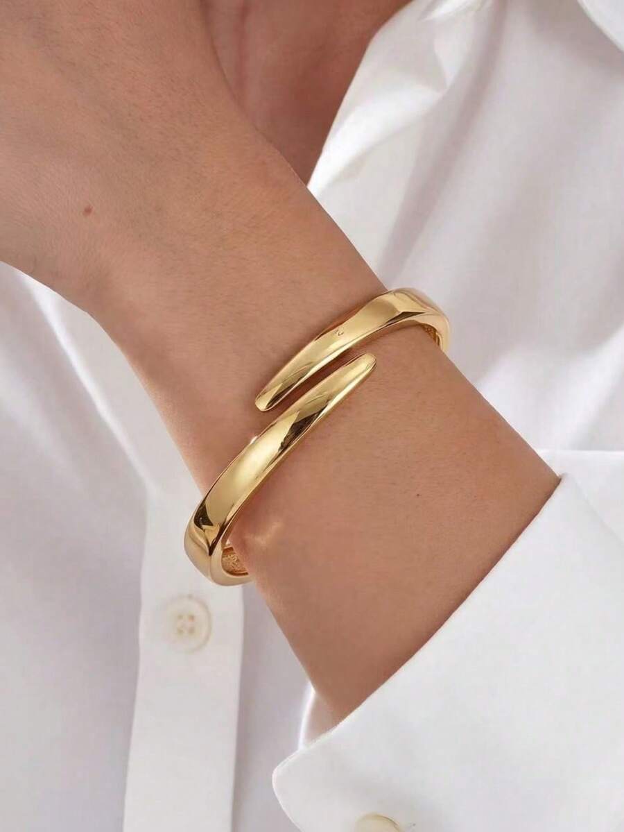 1pc Minimalist Asymmetric Cross Spring Design Bracelet, Polished Gold Plated Elastic Open Cuff Bracelet Suitable For Daily Jewelry Matching, Unisex - Gold - View 1