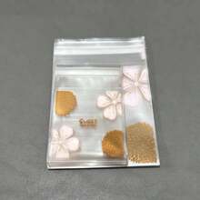 100個自黏式OPP塑膠袋，櫻花與向日葵圖案設計，透明可重複使用禮品包裝，適用於節日、派對與活動 - SWEET - 查看 5