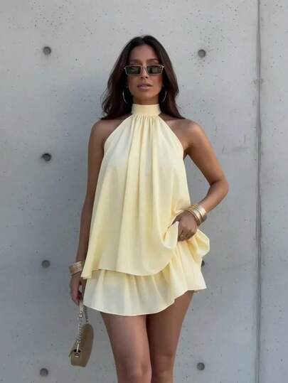 Conjunto 2 Peças Blusa Bata Solta Frente Única Costas Nuas Regata Amarração No Pescoço Short Saia Cintura Alta Babado Rodado Solto Plissado Moda Tendencia Feminina Festa Primavera Verão