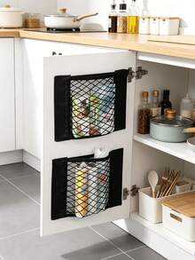 1pc Multi-Functional Breathable Mesh Wall-Mounted Trash Bag Storage Rack With Elastic Rope And Hook And Loop, Easy Installation; Suitable For Cabinet Door, Bathroom, Kitchen, Car Backrest And More, Keeps Clutter Organized, Practical Storage Solution For Home, Back To School Season, St. Patrick's Day, Easter, Mother's Day Gift Choice - Multicolor - View 2
