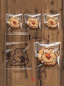 100入透明自黏烘焙包裝袋，可愛卡通設計，適用於切片麵包與吐司、學校用品、食品袋、食品盒，適合裝糖果、巧克力、餅乾等 - 無色 - 查看 7