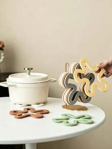 1pc Modern Style Silicone Hollow Flower-Shaped Heat-Resistant Mat, Stackable With Metal Storage Rack, Non-Slip Table Mat Pot Holder, Suitable For Home Kitchen, Dining Table, Family Dinner, Holiday Party, All Seasons - View 3