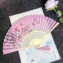 流苏中式折扇，颜色随机。竹骨款式也是随机的。男女通用的传统中式扇子。适合景区、舞蹈表演和作为纪念品。竹骨款式随机最佳礼物 - 黑色 - 查看 7