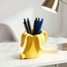 1pc Creative Banana Shaped Pen Holder, Minimalist INS Style Desktop Storage Decor. Realistic 3D Banana Design, Unique And Creative. Can Store Various Stationery, Makeup Brushes And Small Accessories, Smooth Craftsmanship For Hands. Desk, Office Desktop, Dual Use For Storage And Decoration, Niche And Stylish, Full Of Healing Vibes. - View 3