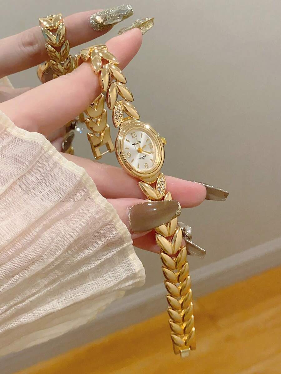 白色錶盤搭配混合刻度,獨特設計錶帶,優雅金色橢圓石英女款手錶,適合日常佩戴 - 金色 - 查看 1