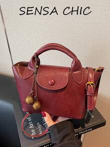 純色油蠟做舊紋理手提包，翻蓋按扣開合，短頂把手搭配可拆卸可調節長斜背帶，小巧尺寸適用於工作、通勤、購物、約會與短途旅行 - 酒紅色 - 查看 9