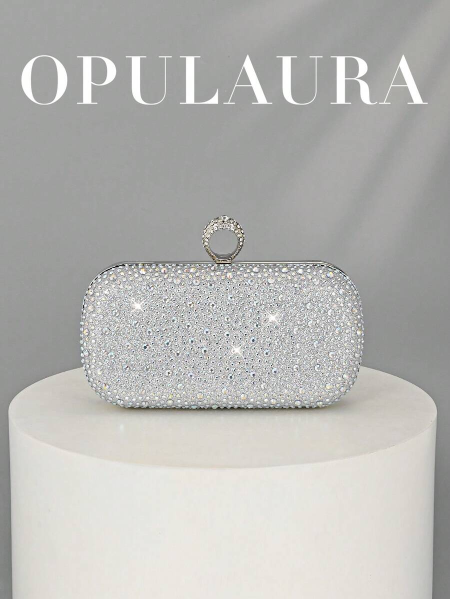 OpulAura 女士水钻装饰晚宴手拿包,闪亮的盒状手提包搭配金属链条,是婚礼、派对、圣诞节、万圣节舞会和夜间活动的理想之选。也是生日、情人节和聚会的理想礼物。可用作斜挎包、手提包、手拿包,也可用作化妆包。完美的婚礼必备单品,可与毕业礼服和正式礼服完美搭配。 - 銀色 - 查看 1