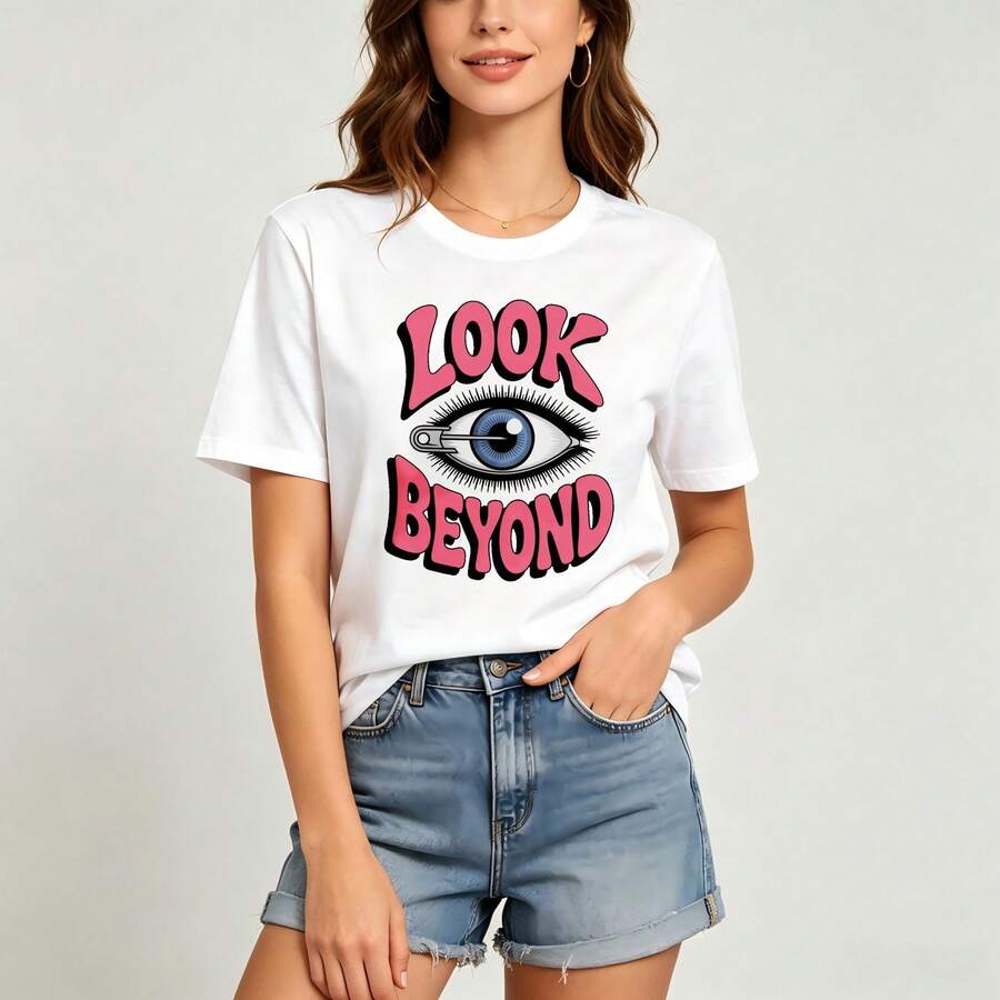 Playful Surreal Graphic Ladies Short‑Sleeve Tee, Safety‑Pin Decorated Eye Motif, Bright Bold Typography, Great For Casual Urban Day Looks