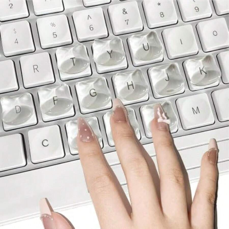 長爪用キーボード 隆起ステッカー 猫頭デザイン 64個入り 透明 可愛い猫の形 文字拡大 文字隠れなし 粘着式簡単貼付 ネイルアート 女性向けタイピング爪保護 ノート PC デスクトップ汎用 - 写真のように - チェックする 1