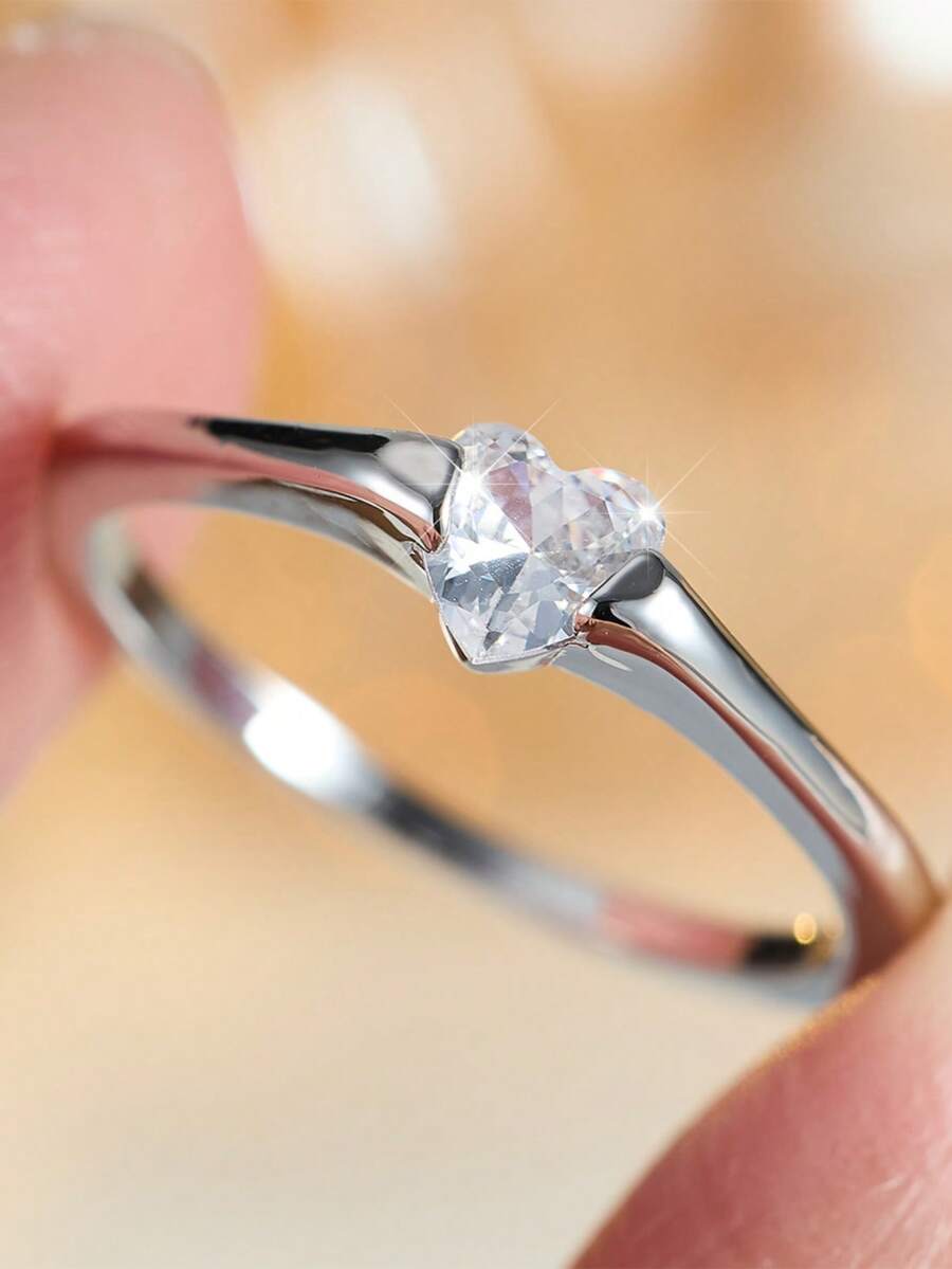 1 pieza Anillo solitario minimalista de tono plateado, anillo de dedo con una sola piedra CZ redonda transparente para mujeres, uso diario y compromiso - Anillo sencillo - Ver 1