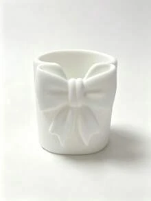 Mini Cream-Colored Bow-Shaped Creative Toothbrush Holder, Can Be Used As A Toothbrush Cup Or Desktop Storage Organizer. It Can Hold Toothbrushes, Toothpaste And Other Items. At The Same Time, It Can Also Be Used As A Flower Pot Or Vase To Add Decorative Effect To The Vanity, Making It An Ideal Choice Among Bathroom Supplies. Perfect For Creating A Warm Home Bathroom Atmosphere, And Also An Ideal Choice For Autumn Decor And Back To School Season. - Multicolor - View 9