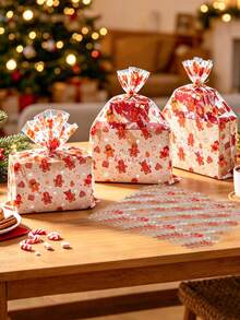 10/30pcs Christmas Transparent Cellophane Gift Bags, Gingerbread Man Pattern Design Christmas Candy Bags, Christmas Gift Bags, Christmas Gift Basket Packaging Bags, Merry Christmas Party Supplies, Baby Christmas Gift Bags, Christmas Tabletop Decorations, Christmas Home Decor, Christmas Room Decor, Christmas Decorations, Christmas Gifts, Party Fillers, Party Favors, 2027 New Year - Christmas Gingerbread Man - View 3