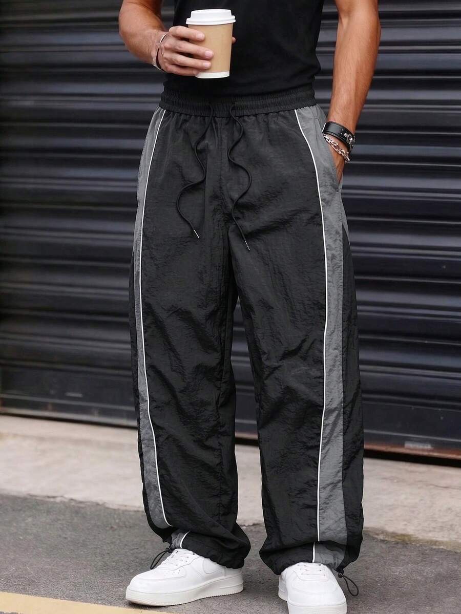 Men's New Casual Long Pants. Drawstring Minimalist Design. Side Pockets Design. Soft And Comfortable Fabric - Convenient To Carry And Store. Suitable For Outdoor And Daily Wear - Black - View 1