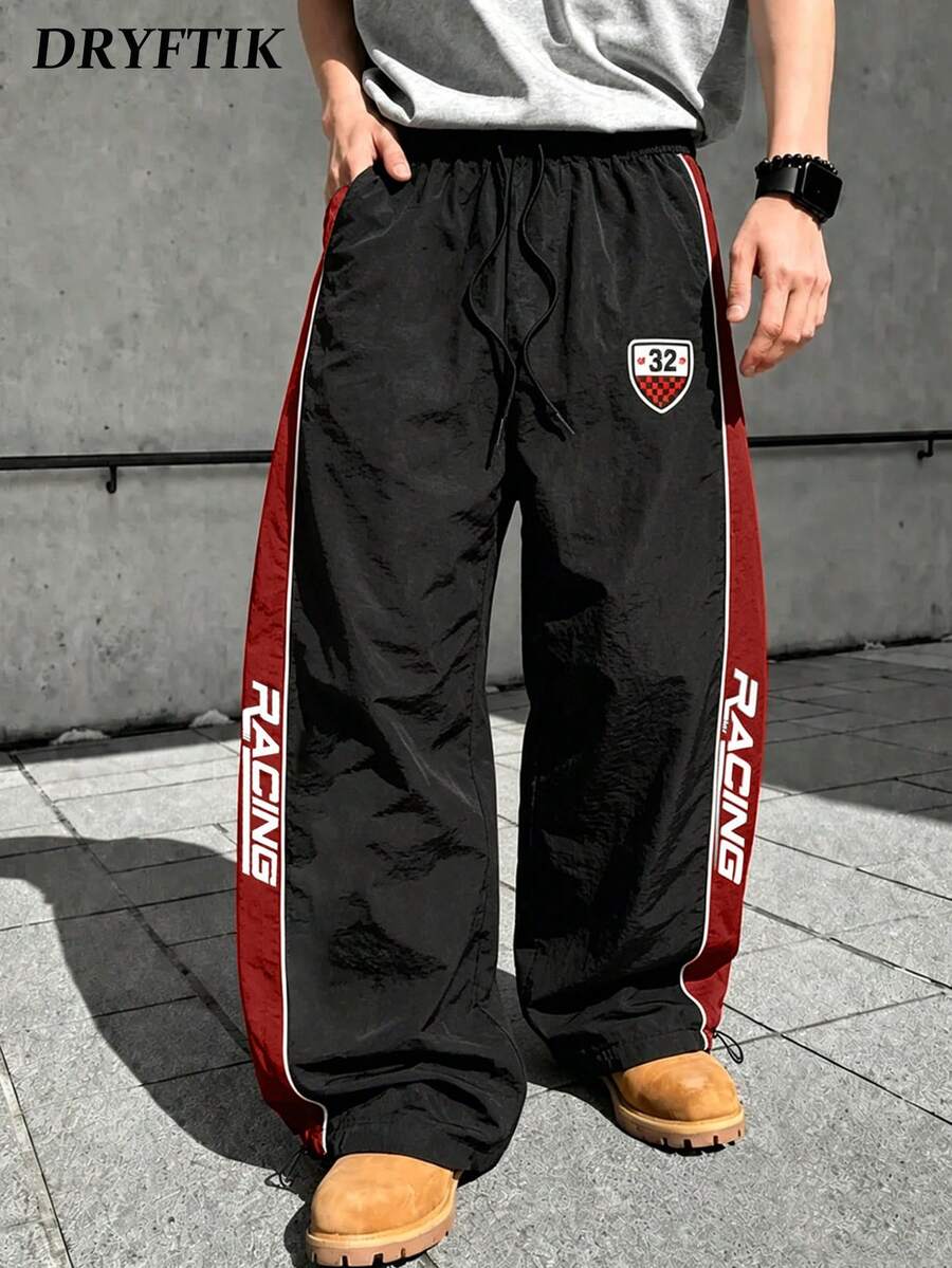 Men's Contrast Color RACING Letter Wide Leg Parachute Pants, Drawstring Elastic Waist, No. 32 Racing Shield Badge Print, Drawstring Hem Sports Long Pants - Black - View 1