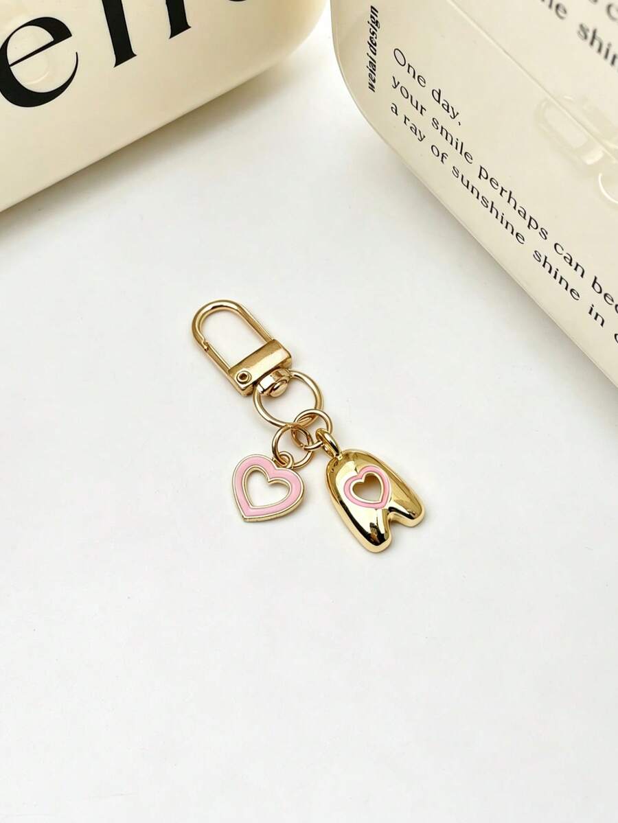 1pc 26 Letters Oil Drop Hollow Heart Pendant Initial Keychain, Bag Charm Pendant, Copper Material, Perfect Gift For Couples And Friends - Random Color - View 1