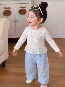 Cute Autumn/Winter Baby Girl Outfit: White Ribbon Bow Lace Trim Round Neck Long-Sleeved Top & Blue Plaid Wide-Leg Pants For Commuting And . - White - View 1
