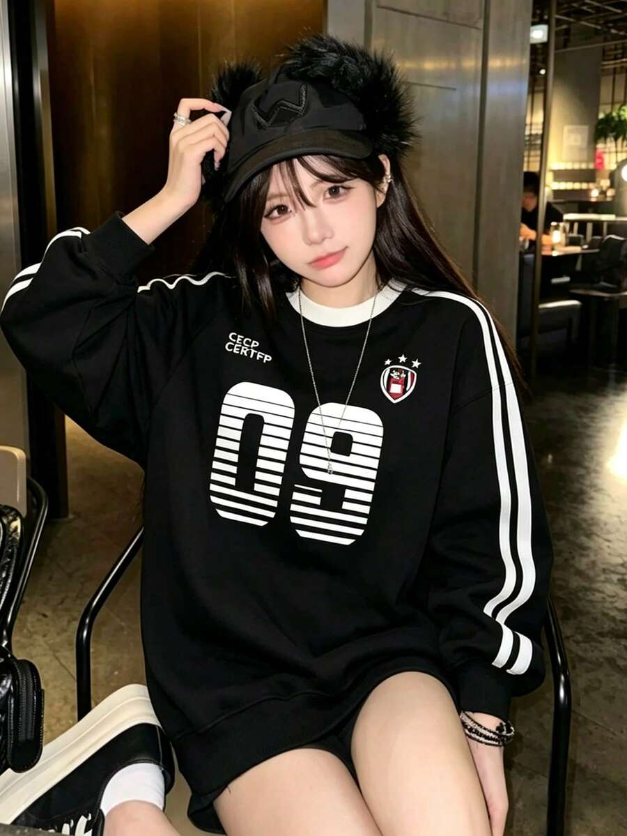 女款黑色聚酯纖維長袖圓領套頭運動衫,側邊條紋印花,標準長度運動版型休閒風 - 黑色 - 查看 1