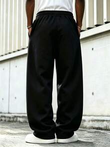 Unisex Split Seam Wide Leg Sweatpants, Comfortable Knit Sports Fabric, White Contrast Drawstring, Small STAR LIGHT Letter Patch On Waist Side, 3D Cut Loose Wide Leg Casual Long Pants, Available In Multiple Colors - Black - View 6
