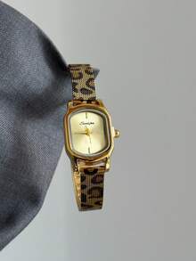 1件金色橢圓形女款石英手錶，配獨特錶帶與金色錶盤，適合日常配戴與街頭風穿搭 - 金色 - 查看 2