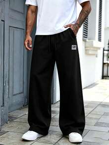 Unisex Split Seam Wide Leg Sweatpants, Comfortable Knit Sports Fabric, White Contrast Drawstring, Small STAR LIGHT Letter Patch On Waist Side, 3D Cut Loose Wide Leg Casual Long Pants, Available In Multiple Colors - Black - View 3