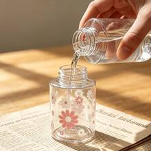 1 Pc Portable Transparent PET Refillable Travel Bottle With Cute Chrysanthemum, Travel-Size Cosmetic Bottle With Flip Cap For Nail Polish Remover, Toner, And Makeup Remover, Pump Dispenser Design - View 4