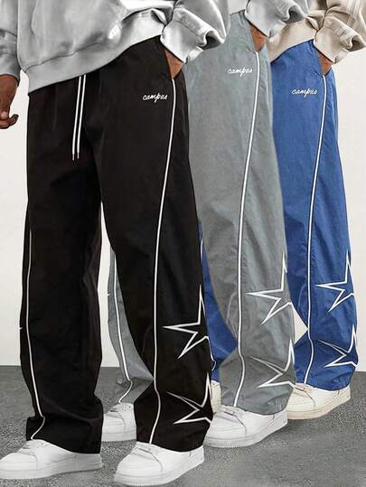 Pantalones de chándal holgados de estilo callejero para hombres, diseño de cintura con cordón, pantalones casuales con bloques de color, adecuados para uso diario; decoración de bordado de estrellas en los bordes, cintura elástica cómoda; estilo deportivo con cordón; estilo de moda con bloques de color; ajuste casual de pierna recta; pantalones de pierna ancha holgados. Estilo de moda de gimnasio, adecuado como regalo.