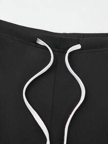 Women's Black And White Contrast Color Spaghetti Strap Cropped Top With Drawstring Flare Pants 2 Pieces Set - Black - View 4
