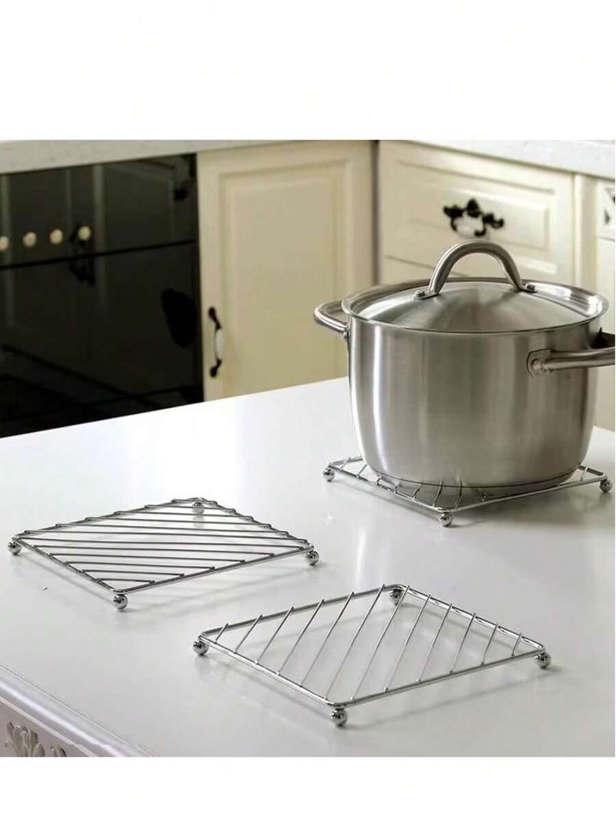 Square Stainless Steel Heat-Insulating Pot Trivet, Metal Iron High-Temperature Resistant Pot Stand, Hollow Heat-Dissipating Anti-Scald Pad, Kitchen Countertop Heat-Insulating Storage Rack, For Placing Hot Pots, Soup Pots, Bowls And Dishes, Non-Slip Ball Feet, Home Dining Table Anti-Scald Protective Pad, Kitchen Utensil Storage Heat-Insulating Bracket - View 1