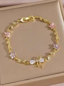 1pc Cherry Blossom Bow Bracelet, 18K Gold Plated Copper Material, Inlaid With Mysterious Lucky Blue And Pink Rhinestones, Birthstone Bracelet, Perfect Gift For Her, Suitable For Women To Wear, Can Be Used For Spring Outings, Dates, Daily Wear, Anniversaries, Birthday Gifts, Elegant Mom Gifts, Christmas Carnival, Weddings, Rave Parties/Dances/Gatherings/Accessories, Valentine's Day Gifts, Bohemian Style Jewelry, Bridesmaid Gifts - Gold - View 2