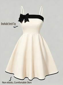 This Elegant And Fashionable Summer Girls' Dress Features A Classic Black And White Color Block Design With A Bow Shoulder Strap. Suitable For Birthday, Party, Daily Outdoor Travel, And Also Makes A Great Gift For Children. - Apricot - View 2