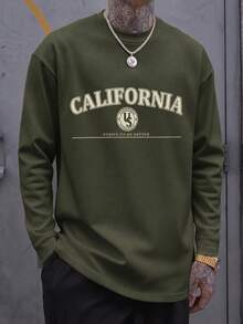 Playera de hombre de manga larga, estilo informal para primavera y otoño‑invierno, con llamativo diseño de estampado. Ideal para ocasiones festivas y excelente opción de regalo. - Verde militar - Ver 1
