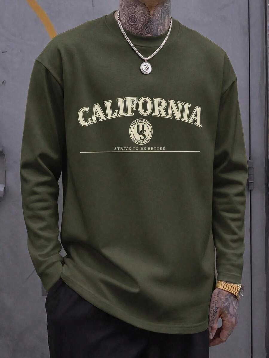 Playera de hombre de manga larga, estilo informal para primavera y otoño‑invierno, con llamativo diseño de estampado. Ideal para ocasiones festivas y excelente opción de regalo. - Verde militar - Ver 1