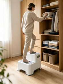 Two‑Step Step Stool With Anti‑Slip Pedals For Stable Fall‑Proof Use. Made Of Thickened Plastic For Sturdiness And Durability. It Features A Side Carry Handle And Is Practical For Home Use. - Random Color - View 1