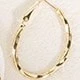 Anting-anting oval emas berpilin