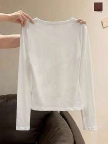 A New Women's Casual Top Featuring A , Retro, Fitted Style And A Stars And Stripes Silhouette Print. - White - View 3