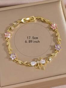 1pc Cherry Blossom Bow Bracelet, 18K Gold Plated Copper Material, Inlaid With Mysterious Lucky Blue And Pink Rhinestones, Birthstone Bracelet, Perfect Gift For Her, Suitable For Women To Wear, Can Be Used For Spring Outings, Dates, Daily Wear, Anniversaries, Birthday Gifts, Elegant Mom Gifts, Christmas Carnival, Weddings, Rave Parties/Dances/Gatherings/Accessories, Valentine's Day Gifts, Bohemian Style Jewelry, Bridesmaid Gifts - Gold - View 5