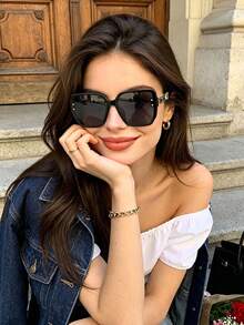 armação preta lentes pretas